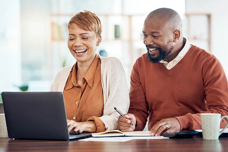 A couple makes a list of things they will pay for using their credit union HELOC.