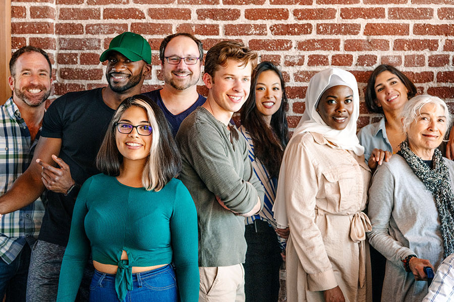 Freedom Credit Union members posing for a group picture outside one of the Philadelphia branches.